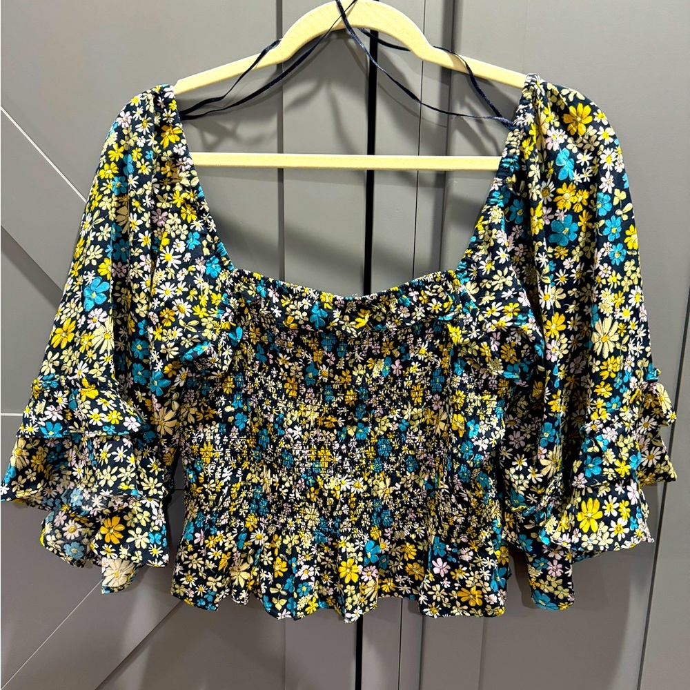 Beautiful floral Patrons of Peace top